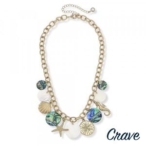 Long metal necklace sea shells and beach details